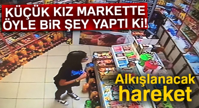 Küçük kız market sahibi yokken şeker aldı parasını kameraya gösterip bıraktı